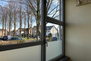 Raam van waar uit mijn zus ons huis kon zien